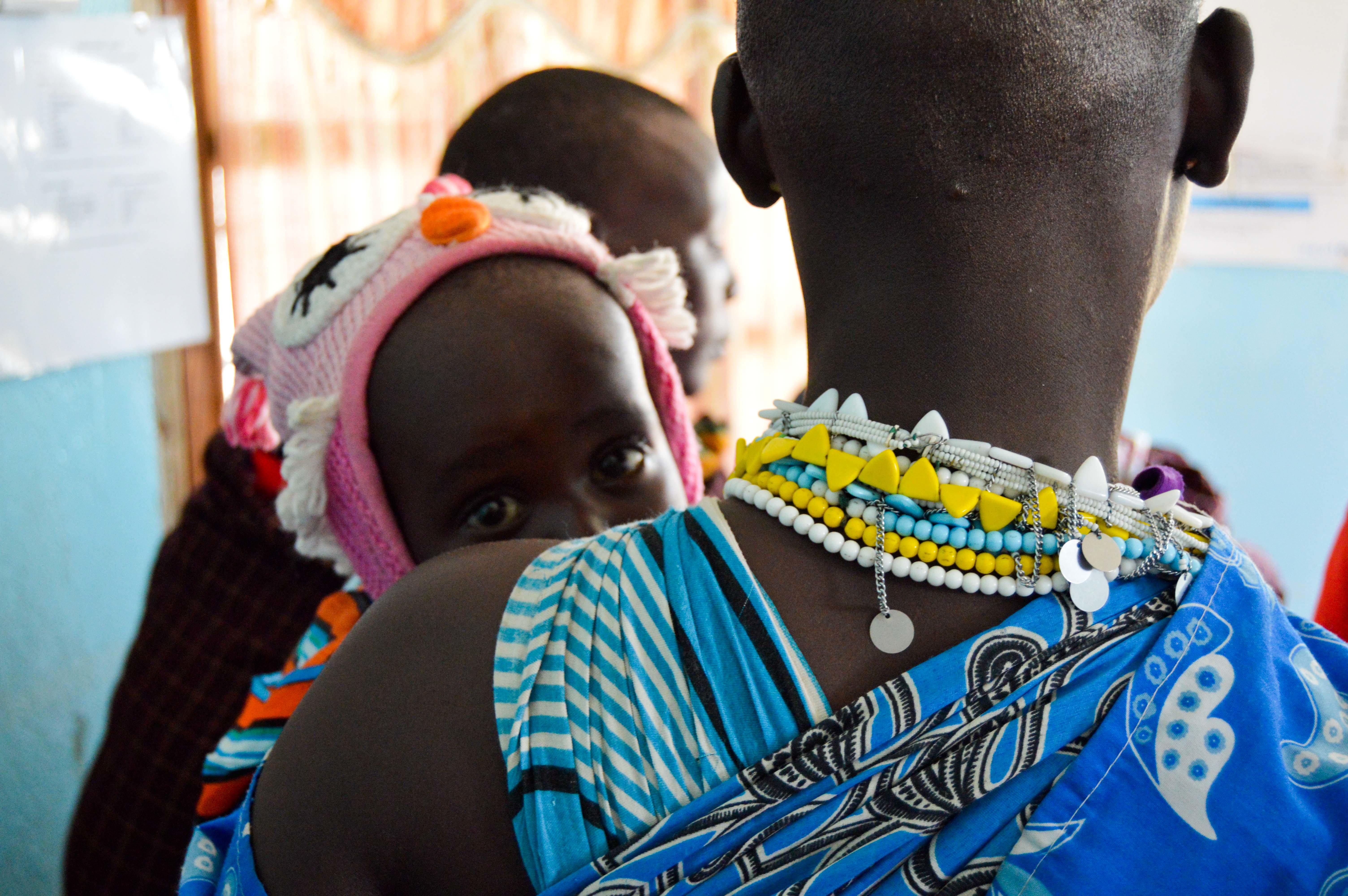 An intern from Projects Abroad photographed a Maasai woman holding a baby at a medical outreach centre during her midwifery internship in Tanzania. An intern from Projects Abroad photographed a local Maasai woman holding a baby at a medical outreach centre during her midwifery internship in Tanzania.